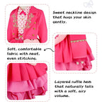 Close-up of embroidered jacket, sleeve trim and layered ruffle skirt